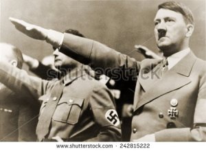 stock-photo-adolf-hitler-giving-nazi-salute-to-hitler-s-right-is-rudolph-hess-242815222